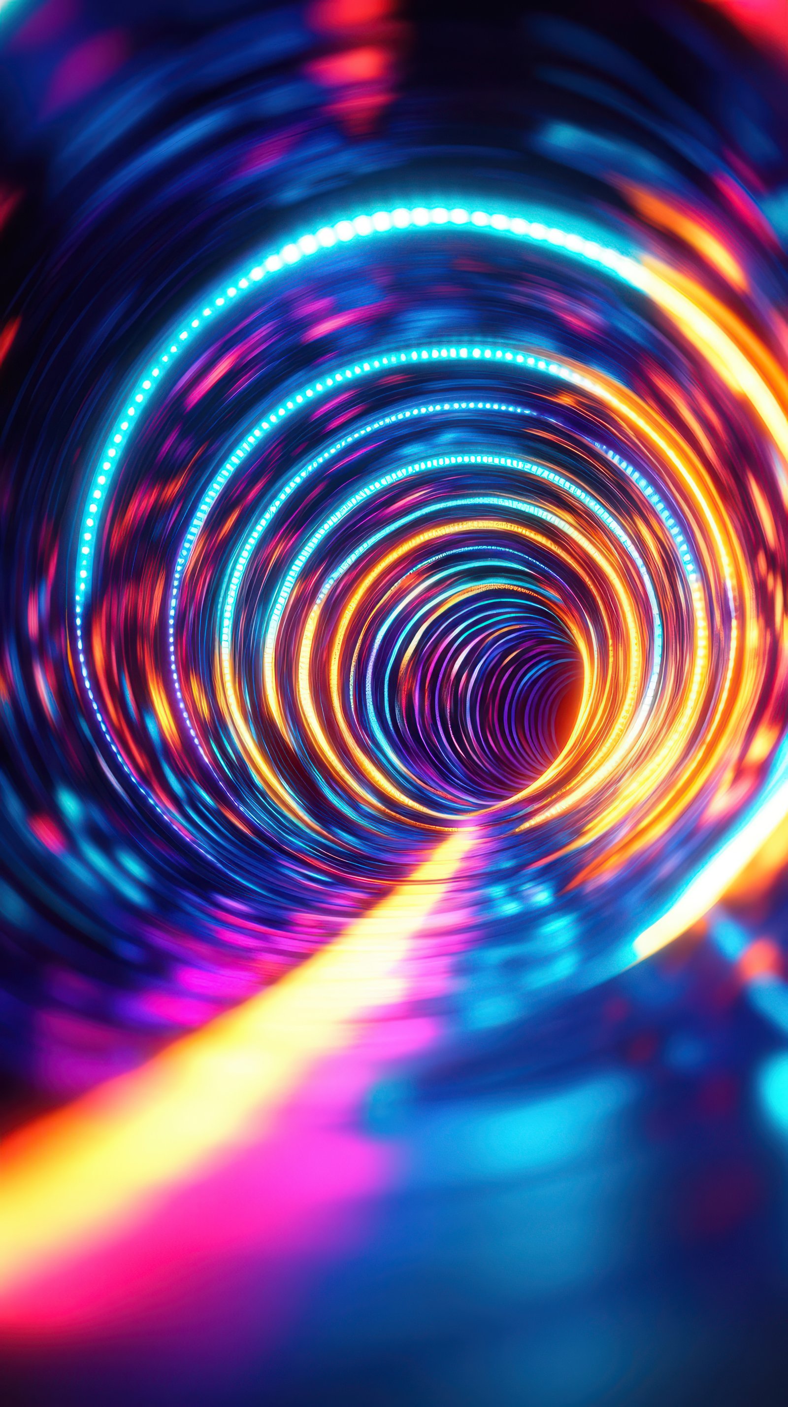 Vibrant light tunnel with swirling colors at night creating a mesmerizing visual journey